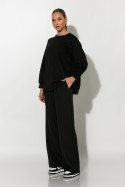 Σετ παντελόνα και oversized μπλούζα με δέσιμο στην πλάτη μαύρο Σετ παντελόνα και oversized μπλούζα με δέσιμο στην πλάτη μαύρο