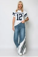 Jean loose fit με υφασμάτινη λεπτομέρεια στο πλάι λευκό