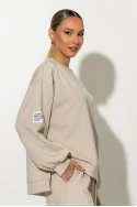 Σετ παντελόνα και oversized μπλούζα με pach στο μανίκι μπεζ Σετ παντελόνα και oversized μπλούζα με pach στο μανίκι μπεζ