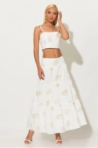 Σετ φούστα και crop top με δέσιμο στους ώμους και σφηγκοφωλία πίσω με κεντητά κοχύλια σιέλ