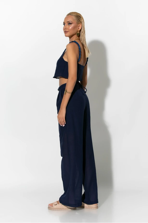 Σετ παντελόνι και crop top με τιράντες και ζώνη από χάντρες μπλε Σετ παντελόνι και crop top με τιράντες και ζώνη από χάντρες μπλε