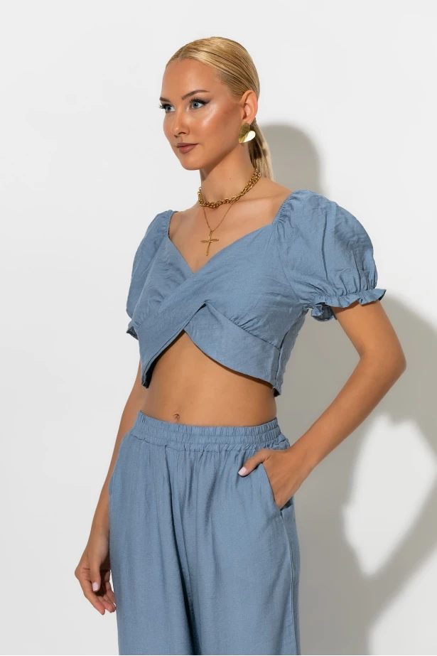 Σετ crop top με V και παντελόνι σιέλ Σετ crop top με V και παντελόνι σιέλ