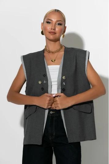 Αμάνικο blazer με διακοσμητικά κουμπιά ανθρακί