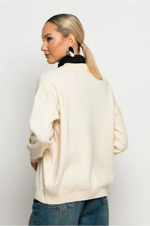 Πλεκτή μπλούζα με pach chic εκρού