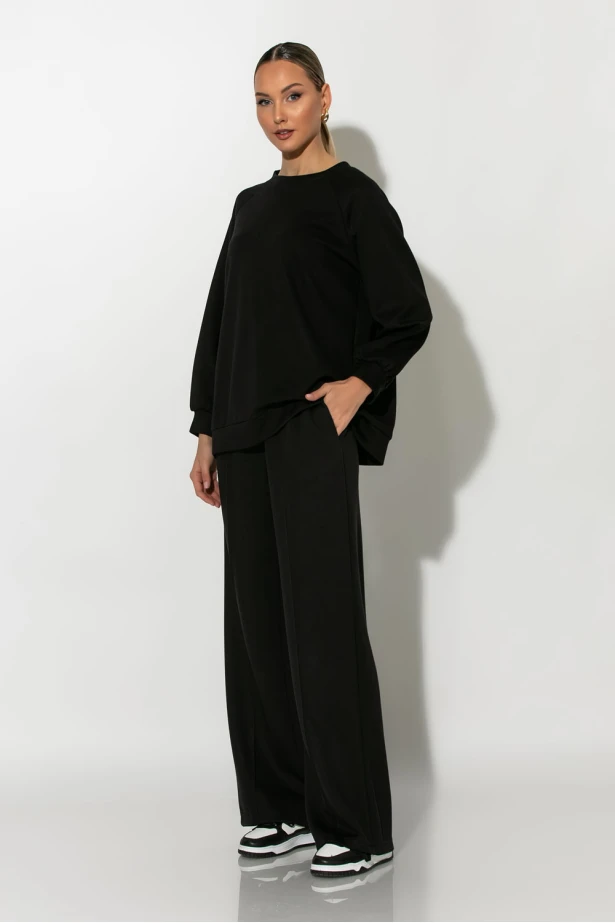 Σετ παντελόνα και oversized μπλούζα με δέσιμο στην πλάτη μαύρο Σετ παντελόνα και oversized μπλούζα με δέσιμο στην πλάτη μαύρο