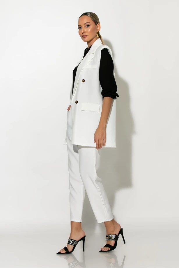 Σετ παντελόνι και oversized αμάνικο blazer με βάτες λευκό Σετ παντελόνι και oversized αμάνικο blazer με βάτες λευκό